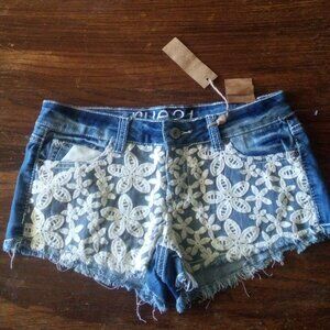 Lace denim shorts